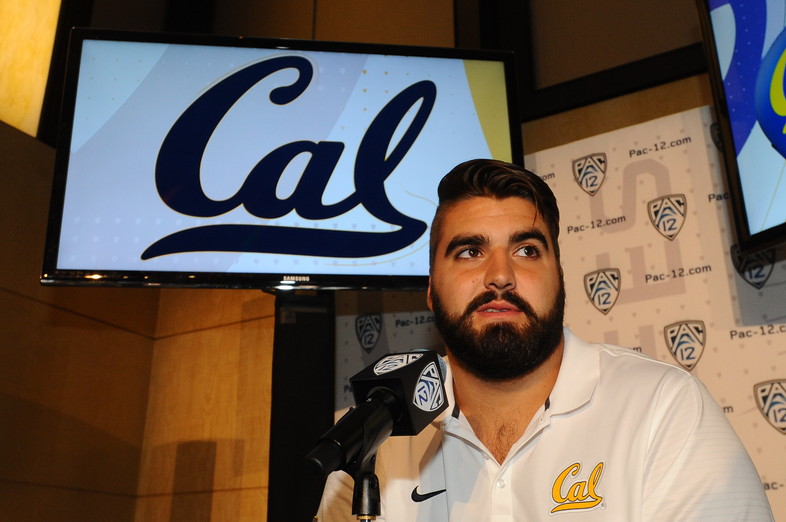 Cal offensive tackle Steven Moore takes questions at the podium.