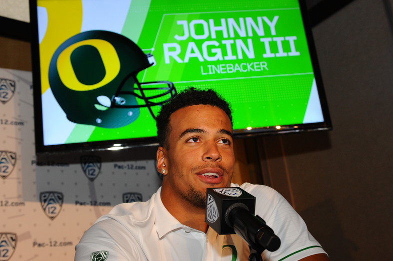 Oregon linebacker Johnny Ragin III speaks with reporters at Media Day. 