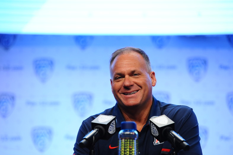 Arizona head coach Rich Rodriguez gets a good laugh in at his Media Day press conference. 