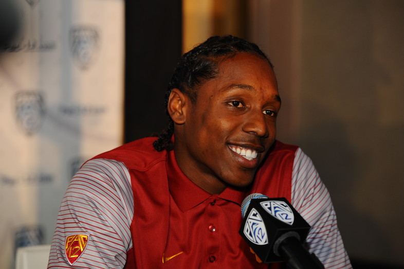 USC WR/DB Adoree Jackson gives reporters a smile at the podium. 
