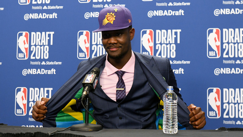 After helping Arizona grab the Pac-12 regular season and tourney title, Deandre Ayton was selected by the Phoenix Suns as the No. 1 overall pick in the 2018 NBA Draft.