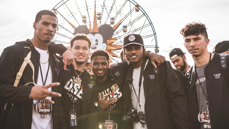 Members of the Washington football team pose for a picture during a visit to Disneyland.