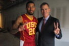 <p>USC senior guard J.T. Terrell (left) rocks his Nike kicks while head coach Andy Enfield (right) sports his dress shoes.</p>
