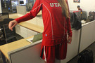 <p>Utah senior forward Michelle Plouffe in her shiny red Under Armour kicks.</p>
