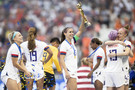Alex Morgan and players of the USA celebrate with the trophy following the 2019 FIFA Women's World Cup France Final match between The United States of America and The Netherlands at Stade de Lyon on July 07, 2019 in Lyon, France. 