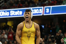 Arizona State's Zahid Valencia lets emotions take over after capping an undefeated season (32-0) with an NCAA title at 174 pounds.
